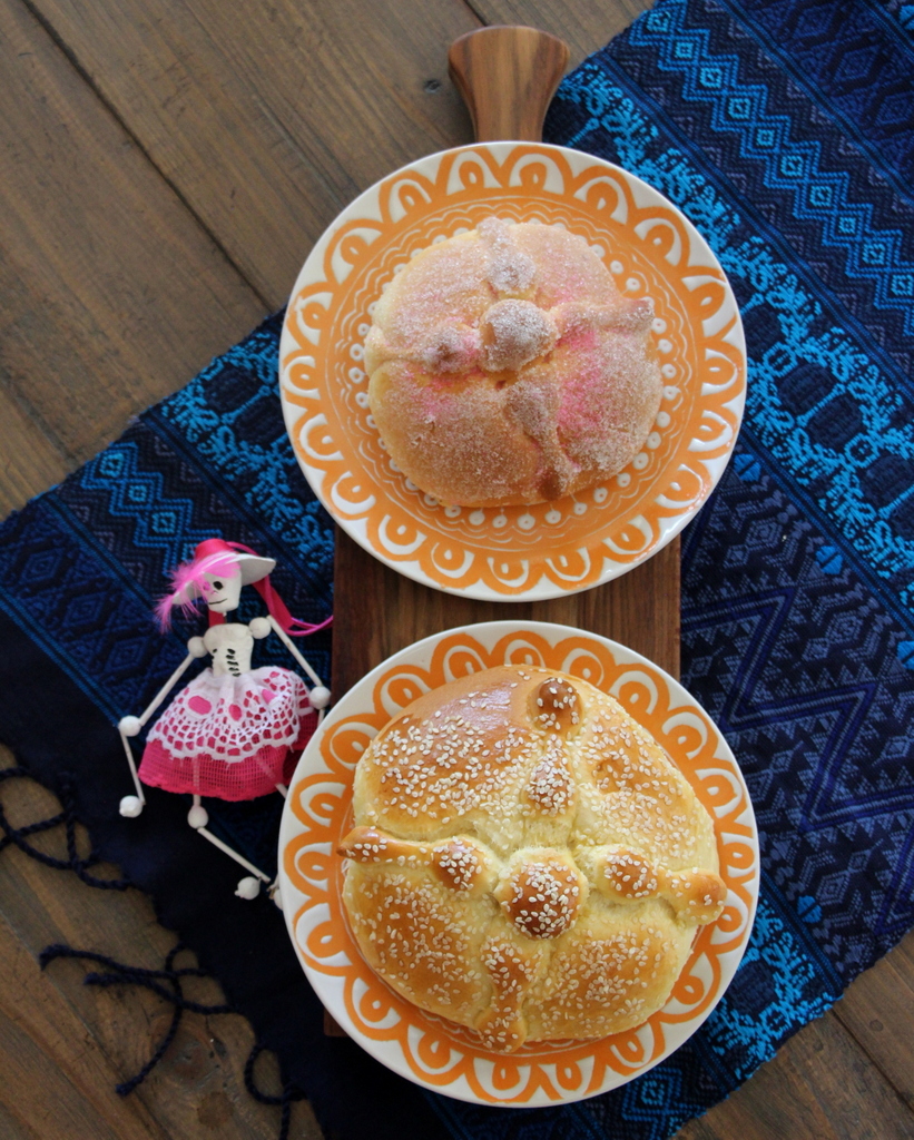 Pan de Muerto (Day of the Dead Bread): This semisweet bread, which is baked in the shape of bones, is left as a gift for the spirits and is a welcoming item that represents the host’s generosity. 